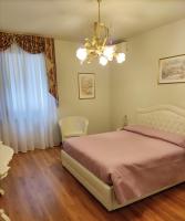 A bed or beds in a room at Dimora al Bosco