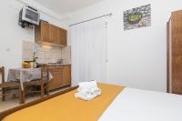 Postel nebo postele na pokoji v ubytování Apartments Erceg