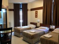 Hotel Nuevo Caminoにあるベッド