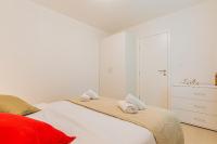 Postel nebo postele na pokoji v ubytování Apartments Lopari