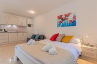 Kuchyň nebo kuchyňský kout v ubytování Apartments Lopari
