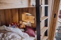 Postel nebo postele na pokoji v ubytování Familienhotel Hinteregger