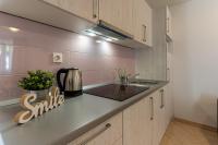 Kuchyň nebo kuchyňský kout v ubytování Apartments Lopari
