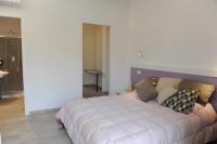 A bed or beds in a room at Il Granaio di Rossetti Elisabetta