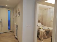 A bed or beds in a room at Blue House Varenna