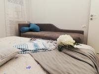 A bed or beds in a room at Blue House Varenna