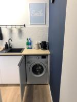Kuchyňa alebo kuchynka v ubytovaní Apartament Blisko Morza i Parku Gdańsk Brzeźno