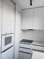 Kuchyňa alebo kuchynka v ubytovaní Apartament Blisko Morza i Parku Gdańsk Brzeźno