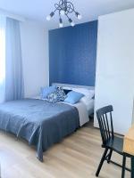 Posteľ alebo postele v izbe v ubytovaní Apartament Blisko Morza i Parku Gdańsk Brzeźno