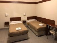 Hotel Nuevo Caminoにあるベッド