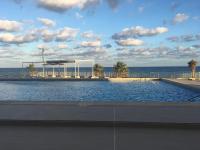 The swimming pool at or close to Apartament BAMBU N°2 przy plaży PIĘKNY WIDOK