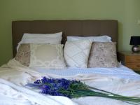 A bed or beds in a room at Avgi Garden House Chania with private entrance
