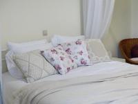 A bed or beds in a room at Avgi Garden House Chania with private entrance
