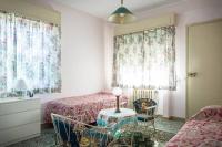 A bed or beds in a room at Villa Belvedere-Con piscina a Bardolino