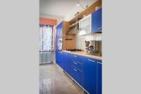 A kitchen or kitchenette at Villa Belvedere-Con piscina a Bardolino