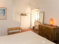 A bed or beds in a room at Holiday Home Danese by Interhome