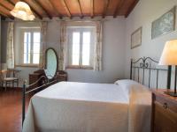 Posteľ alebo postele v izbe v ubytovaní Holiday Home Podere le Valli by Interhome