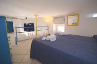 A bed or beds in a room at Villa Manzoni