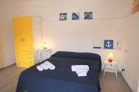 A bed or beds in a room at Villa Manzoni