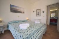 A bed or beds in a room at Villa Manzoni