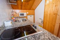 Una cocina o zona de cocina en Apartamentos Cudillero