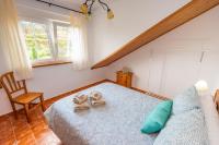 Cama o camas de una habitación en Apartamentos Cudillero