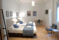 La Perla Granada Suitesにあるベッド