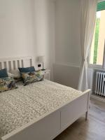 A bed or beds in a room at Verdi appartment