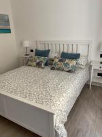 A bed or beds in a room at Verdi appartment