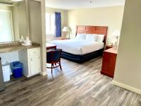 Atlantic Oceanfront Hotel, Wells Beachにあるベッド
