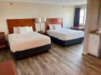 Atlantic Oceanfront Hotel, Wells Beachにあるベッド
