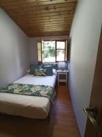 A bed or beds in a room at LA CAPILLA