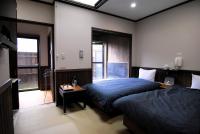旅館　由布山にあるベッド