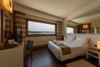 A bed or beds in a room at Hotel Ristorante San Carlo