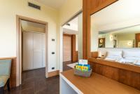 A bed or beds in a room at Hotel Ristorante San Carlo