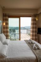 A bed or beds in a room at Hotel Ristorante San Carlo