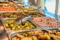 a buffet filled with many different types of food at MPM Hotel Arsena - Ultra All Inclusive in Nesebar