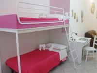 A bed or beds in a room at Case Vacanza da Marco&Mary