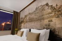 Posteľ alebo postele v izbe v ubytovaní Grand Hotel Esztergom