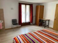 Postel nebo postele na pokoji v ubytování Hôtel du Gd-St-Bernard