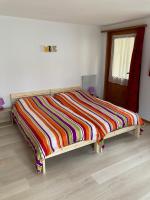 Postel nebo postele na pokoji v ubytování Hôtel du Gd-St-Bernard