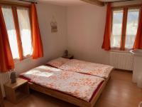Postel nebo postele na pokoji v ubytování Hôtel du Gd-St-Bernard