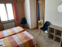 Postel nebo postele na pokoji v ubytování Hôtel du Gd-St-Bernard