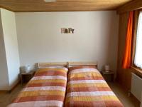 Postel nebo postele na pokoji v ubytování Hôtel du Gd-St-Bernard