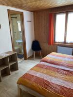 Postel nebo postele na pokoji v ubytování Hôtel du Gd-St-Bernard