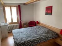 Postel nebo postele na pokoji v ubytování Hôtel du Gd-St-Bernard