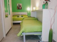 A bed or beds in a room at Case Vacanza da Marco&Mary