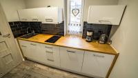 Kuchyňa alebo kuchynka v ubytovaní Apartamenty Silvana