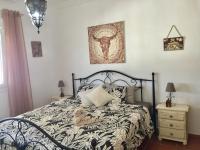 Postel nebo postele na pokoji v ubytování Villa Casira, 10 personen, Viñuela, Andalucía