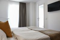 Posteľ alebo postele v izbe v ubytovaní Apartments Rainer